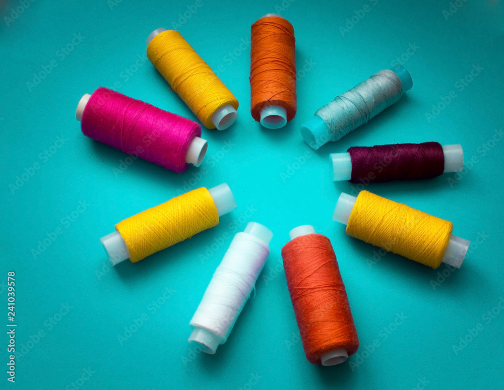 spools of thread in the shape of the sun spools of thread in the shape of the sun
