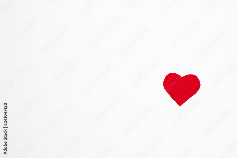 An aerial view of an isolated red heart on a white background