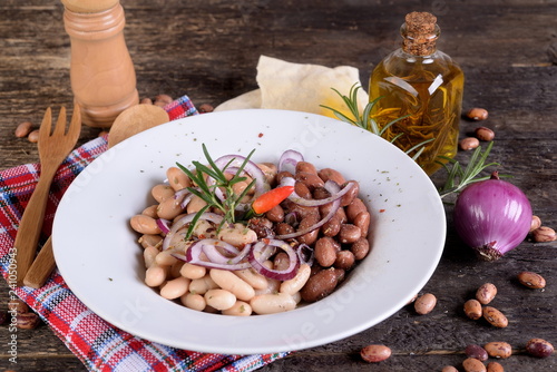 Roman beans with onion, herbs and olive oil   photo