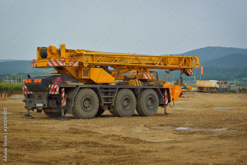 Obraz premium auto crane on construction site