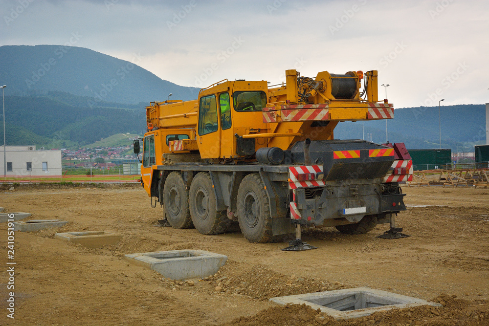 auto crane on construction site auto crane on construction site