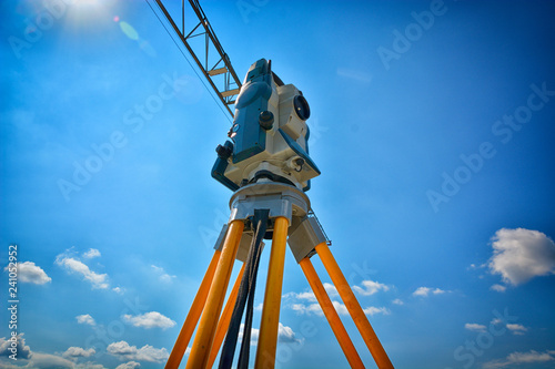 Survey equipment for precise measurement on clouded sky background