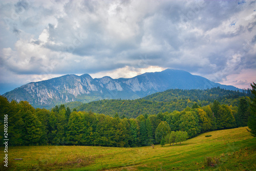 Carpathian mountains summer vintage landscape with blue sky and clouds