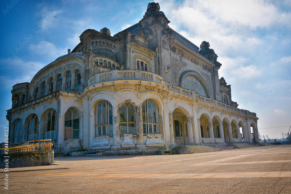 Fototapeta premium The Casino building in Constanta, Romania. Blue sky.