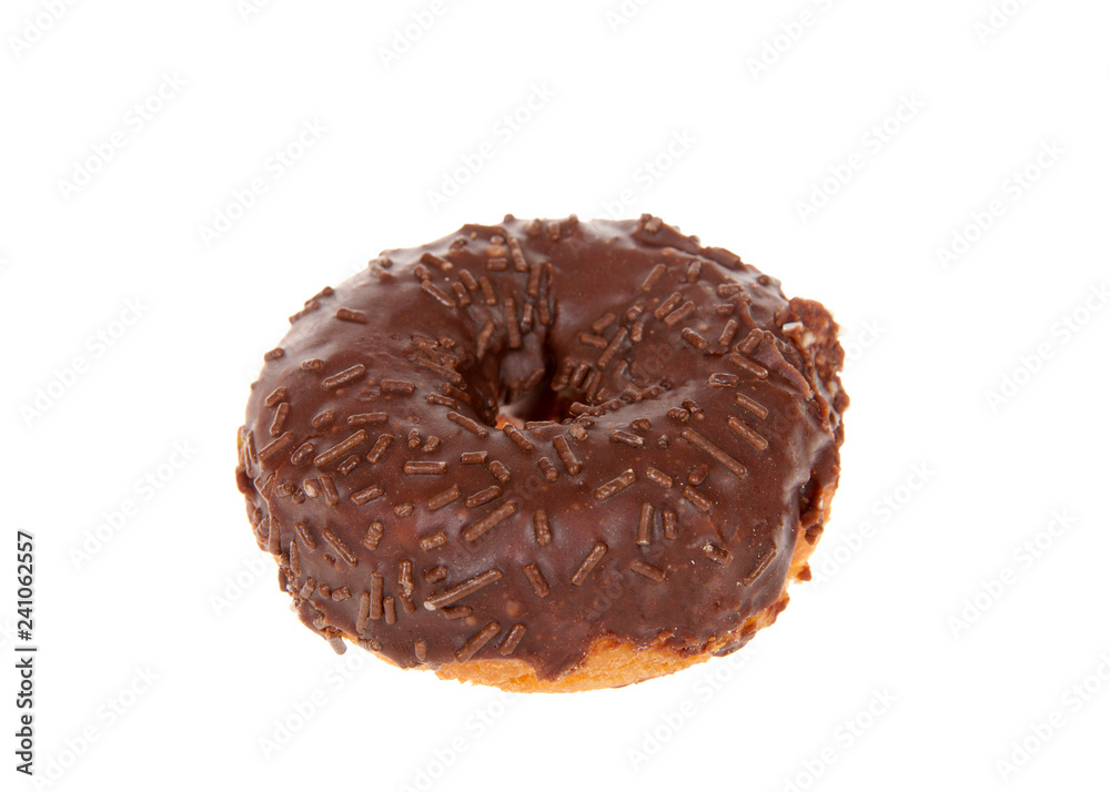 Close up on one cake donut frosted with chocolate frosting covered in chocolate candy sprinkles. Isolated on white background. Close up on one cake donut frosted with chocolate frosting covered in chocolate candy sprinkles. Isolated on white background.