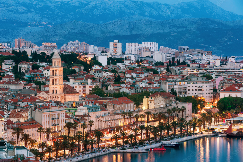 Amazing Split city waterfront panorama at blue hour, Dalmatia, Europe. Roman Palace of the Emperor Diocletian and tower of Saint Domnius cathedral. Split, Croatia.