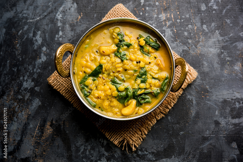 Dal Palak or Lentil spinach curry - popular Indian main course healthy recipe. served in a karahi/pan or bowl. selective focus - obrazy, fototapety, plakaty 
