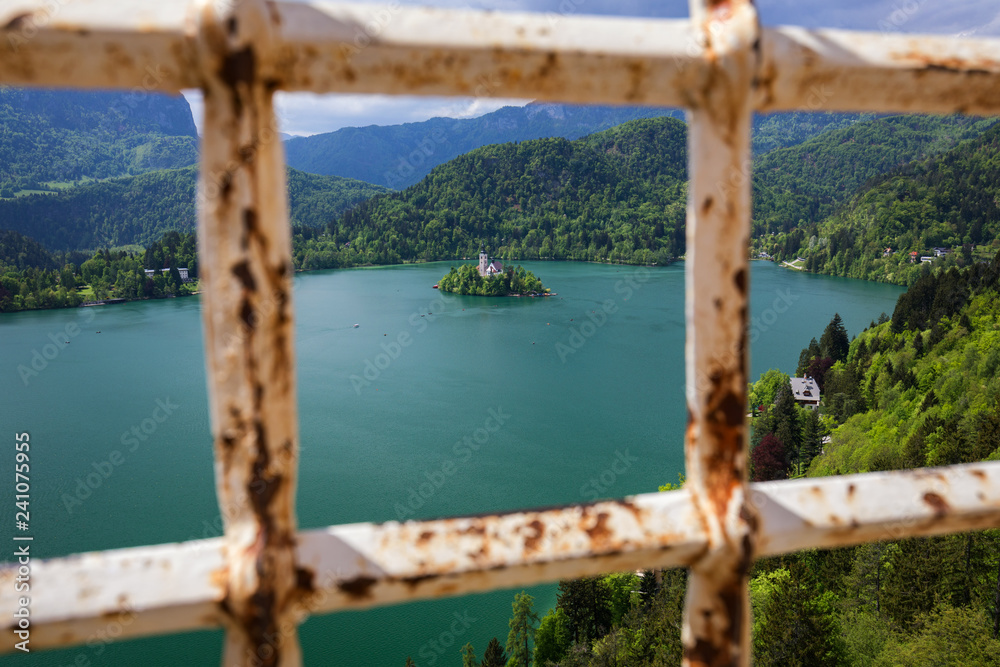 Fototapeta premium Lake Bled with St. Marys Church of Assumption on small island. Bled, Slovenia, Europe. The Church of the Assumption, Bled, Slovenia. The Lake Bled and Santa Maria Church near Bled, Slovenia.