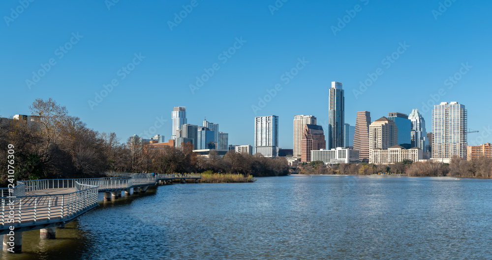 Skyscrappers and Contruction on Downtown Austin With Walkway on the side