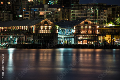 old warehouse on a wharf at night