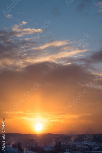 Dramatic sky The sun is beautifully breaking through the clouds. Vertical