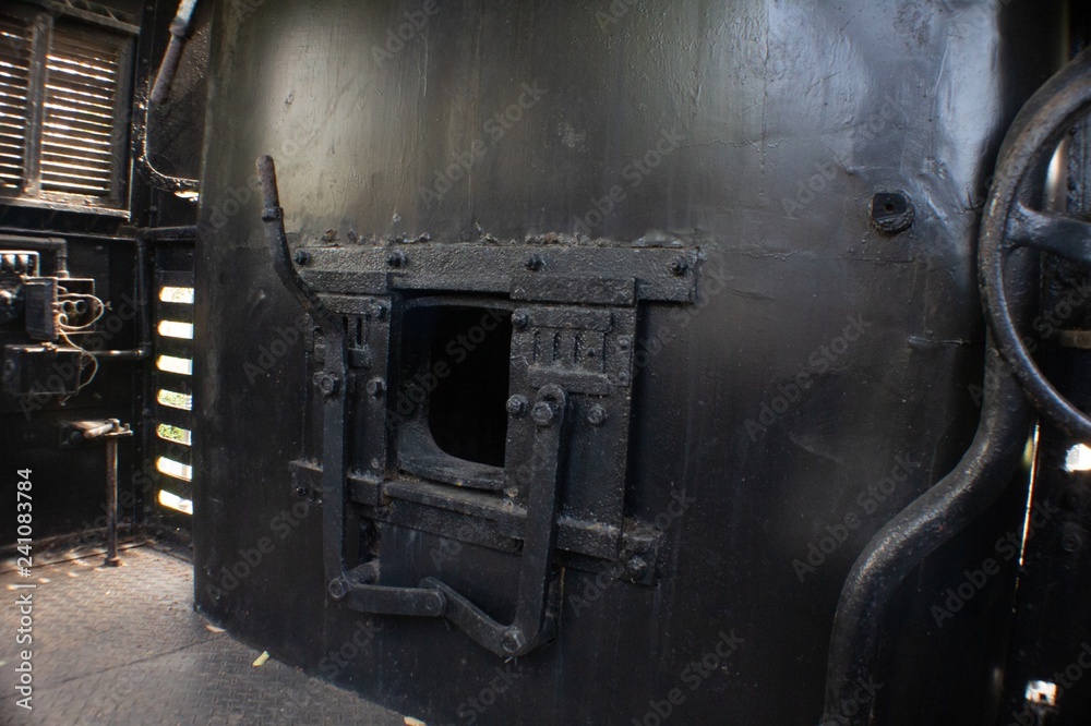 detail of an railway train old steam machine