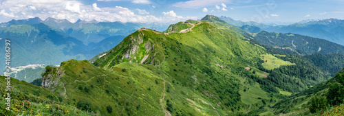 View of the high mountain range with cable cars. Aibga Ridge, Krasnaya Polyana, Sochi, Russia.