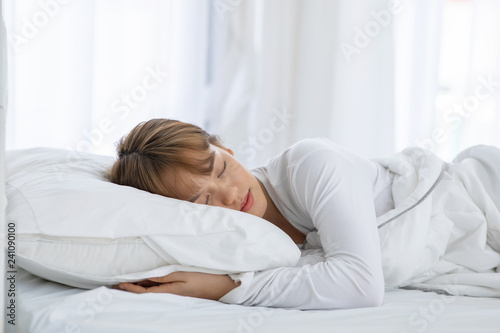 Beautiful Attractive Asian woman sleep and sweet dream on bed in bedroom in the morning feeling so relax and comfortable,Healthcare Concept © 220 Selfmade studio