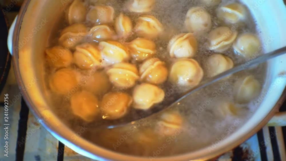 meat dumplings are cooked in a pan.view from above meat dumplings are cooked in a pan.view from above