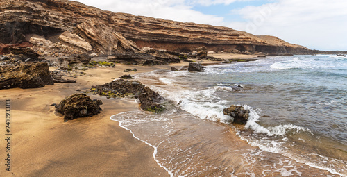 La Solapa, a Virgin Gold-Colored Sandy Beach in Fuerteventura, Canary Islands photo