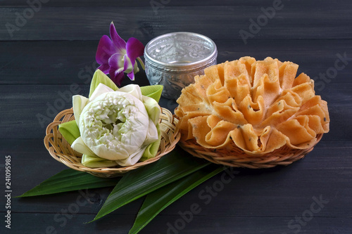 Thai food / Thai snacks: Crispy lotus Blossom Cookie (or Knanom Dok Jog)  One of most famous Thai snacks. photo