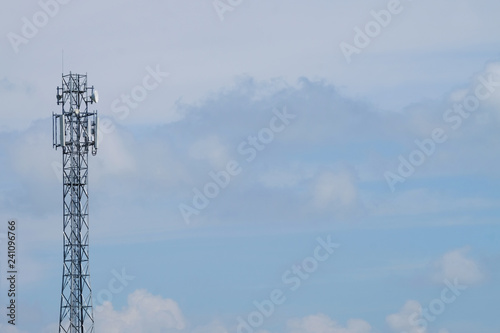 Giant antenna on blue sky and white cloud background
