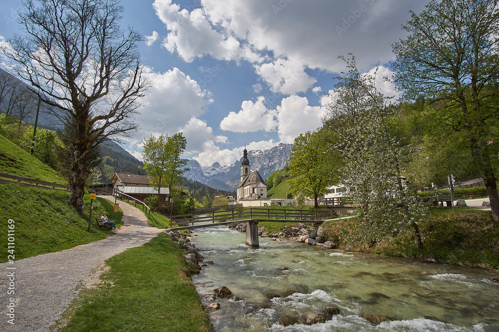 Scenic mountain landscape in the Bavarian Alps with famous Parish Church of St. Sebastian in the village of Ramsau, Nationalpark Berchtesgadener Land, Upper Bavaria