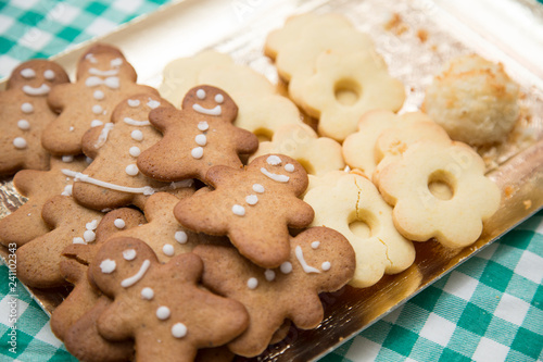 horizontal image with detail of a tray with nice Christmas cookies