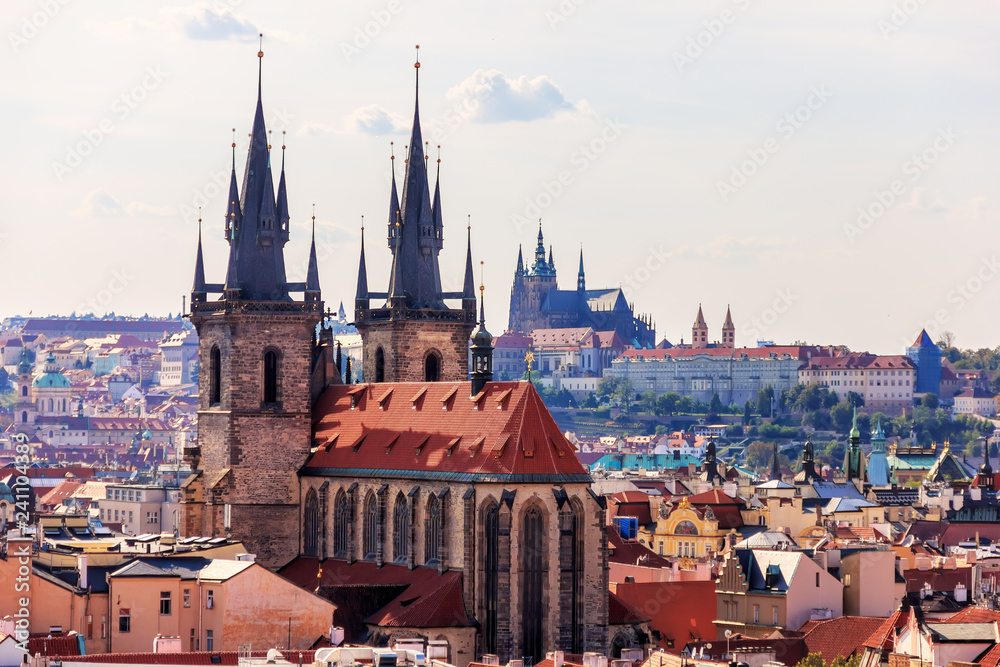 Obraz premium Church of Our Lady before Tyn and the Prague Castle on the backg