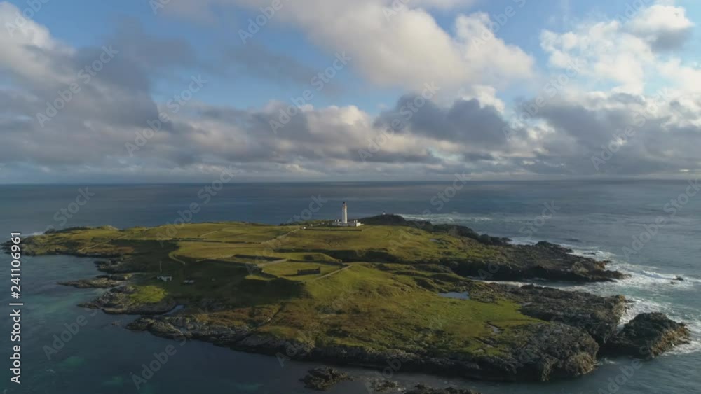 Stunning Aerial Shot in Scottish Highlands, Portnahaven lighthouse on the Isle of Islay Stunning Aerial Shot in Scottish Highlands, Portnahaven lighthouse on the Isle of Islay