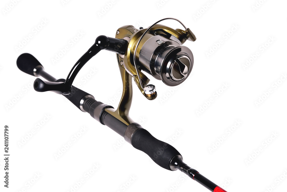 fishing reel on a fishing rod, white background close-up, copy space fishing reel on a fishing rod, white background close-up, copy space
