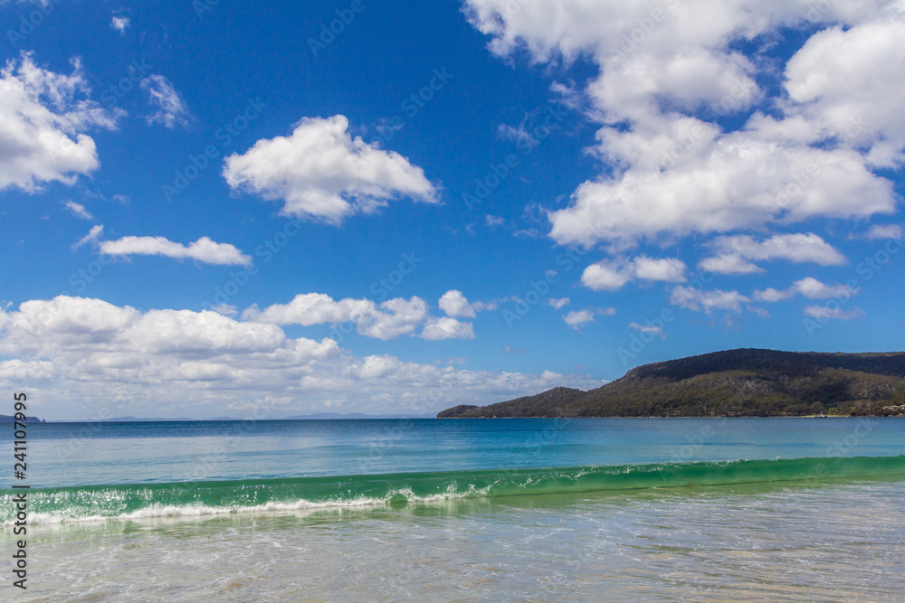 Wave breaking on Adventure Bay beach Tasmania, Australia Wave breaking on Adventure Bay beach Tasmania, Australia