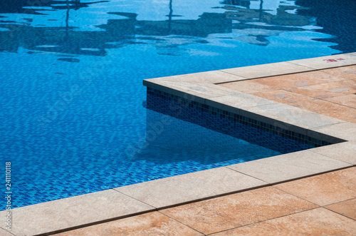 Detail of modern outdoor swimming pool in luxury hotel