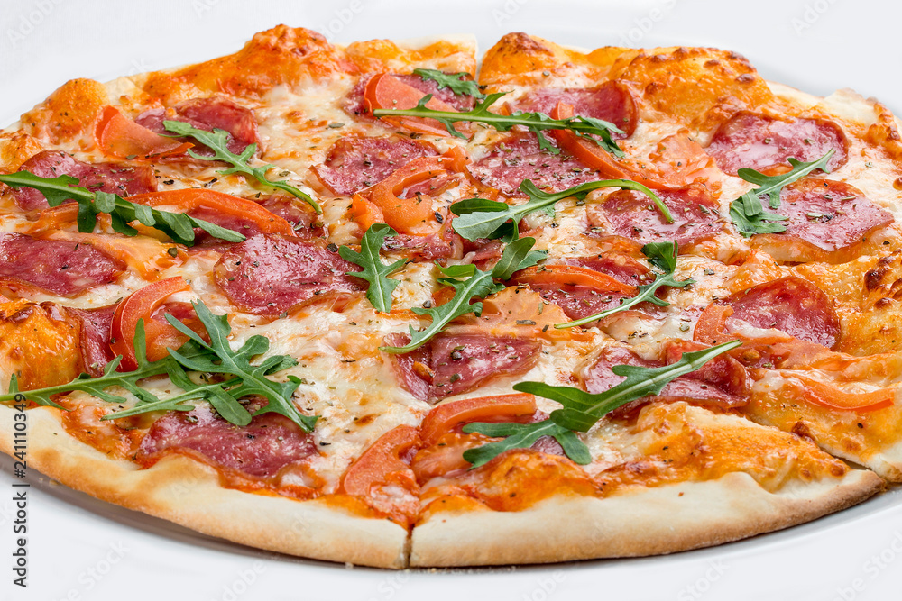 Pizza with salami and bell peppers. On a white background Pizza with salami and bell peppers. On a white background