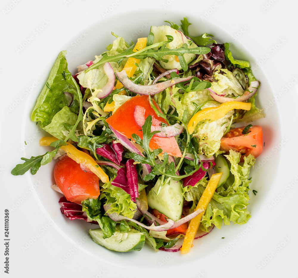 Fresh vegetable salad. On a white background