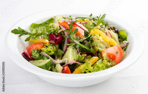Fresh vegetable salad. On a white background