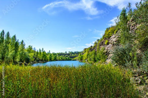 Clean pond on the site of a flooded stone quarry near Makeyevka in the Donbass 11