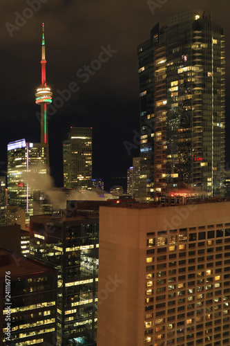 Vertical colorful aerial of Toronto core at night