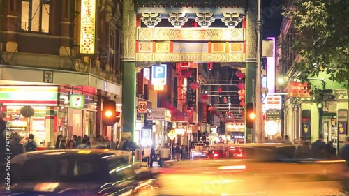 AUSTRALIA, MELBOURNE - APRIL 20, 2018: Timelapse of Chinatown in Melbourne, Australia. Night city life with heavy traffic and streets full of people. Illustrative editorial footage.