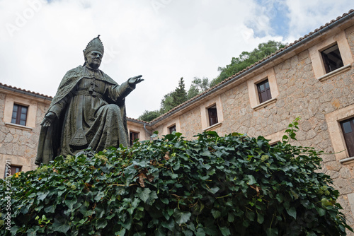 Statue of Bishop Pere-Joan Campins at Santuari de Lluc in Mallorca in Spain photo