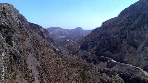 small road through mountains of crete (greece)