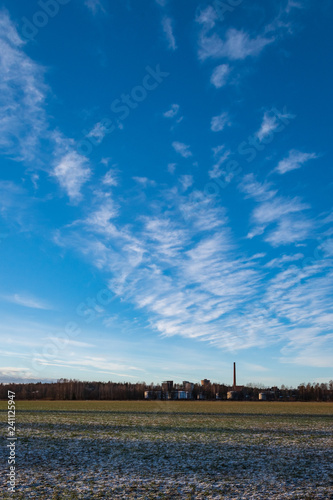 landscape with field and blue sky © mikab