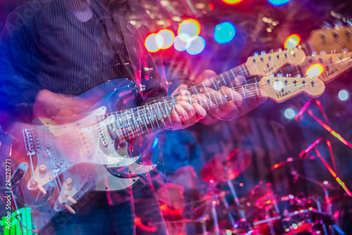 Electric guitar player shaky blurred multiples exposure photo