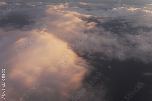 clouds at sunset from iljuminatora plane sky Sun travel