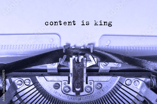 content is king printed on a piece of paper on a vintage typewriter.