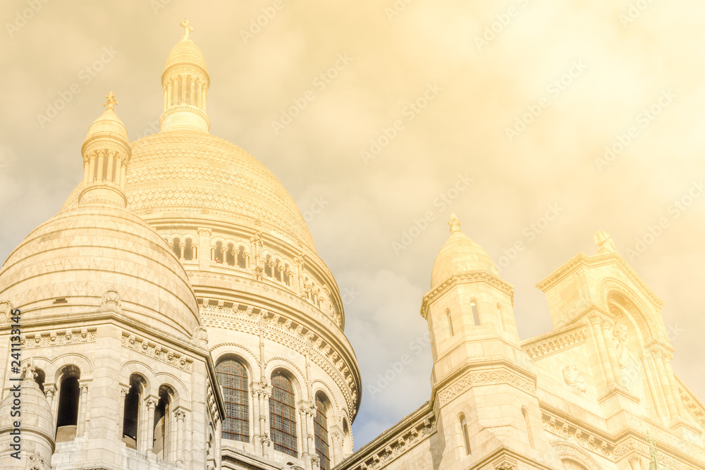 Dome of a catholic church. Paris, France. Montmartre near Basilica Sacre Coeur designed by Paul Abadie, 1914 - Roman Catholic Church and minor basilica, dedicated to Sacred Heart of Jesus.