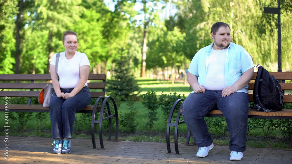Shy girl flirting with handsome fat man, afraid talking with him, insecurities Shy girl flirting with handsome fat man, afraid talking with him, insecurities