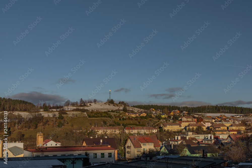 Vimperk town and block of flats in cold winter evening in sunset time