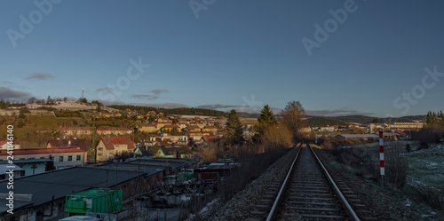 Vimperk town and railway track in sunny winter afternoon