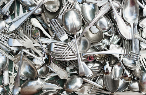 Tossed around old silver cutlery