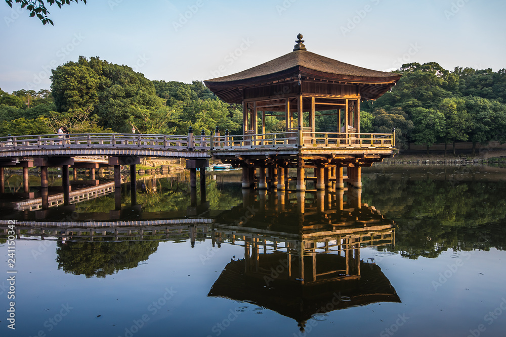 Ukimido Pavilion and the reflections in the lake, Nara, Japan Ukimido Pavilion and the reflections in the lake, Nara, Japan