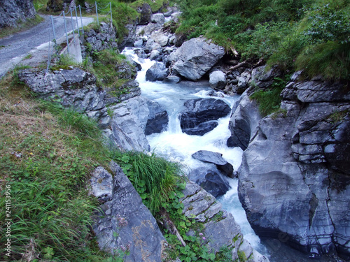 Canyon and stream Sandbach above Linthal - Canton of Glarus, Switzerland photo