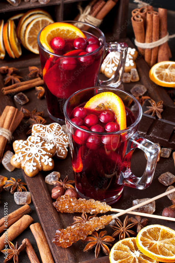 Fototapeta premium Winter hot drink with spices and tasty cookies