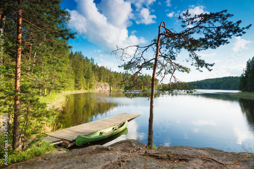 Beautiful canoeing scene at Tervajarvi lake from national park Repovesi, Kouvola, Finland photo